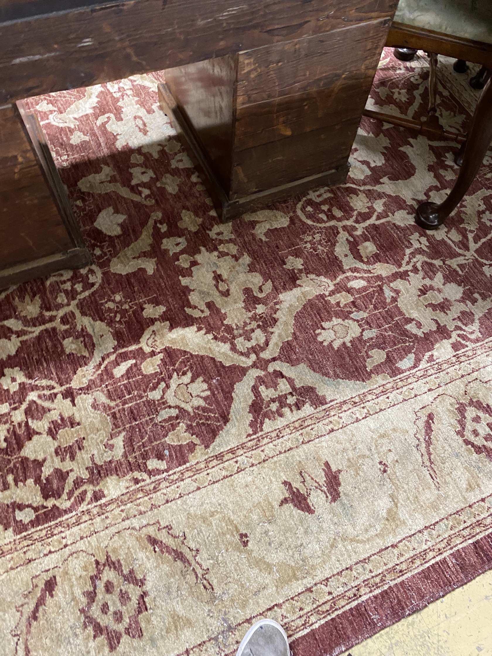 A Zeigler style burgundy ground carpet, 306 x 245cm